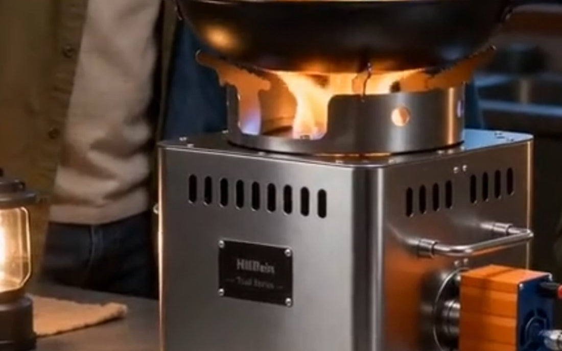 Hillrein fuel efficient wood stove showing a Zhengtu cooking flame under a pan before the next planned cooking step