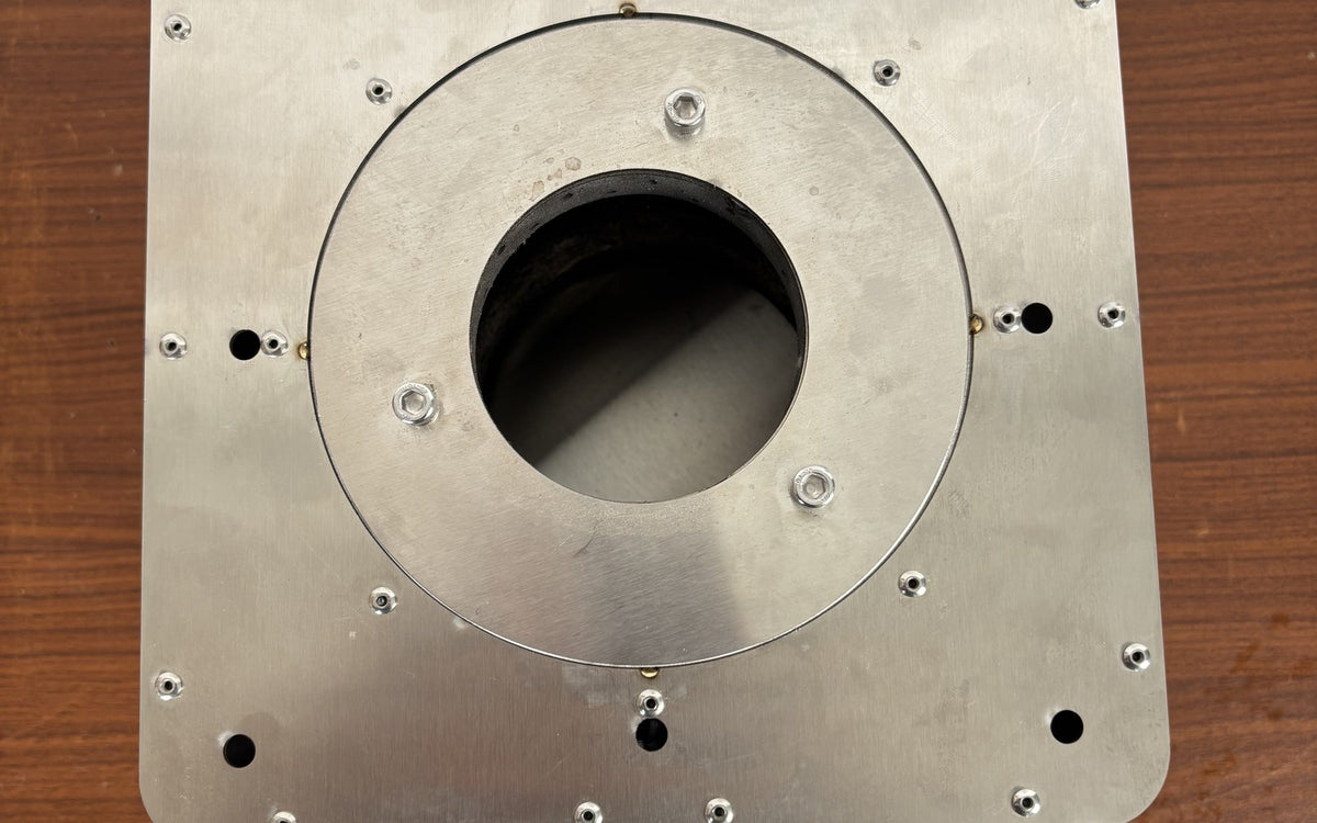 Hillrein wood gasifier stove airflow top view showing the Zhengtu opening and upper plate ready for a clean first load