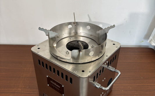Hillrein small wood cooking stove pot-support assembly shown cold and clear before the next Zhengtu cooking session