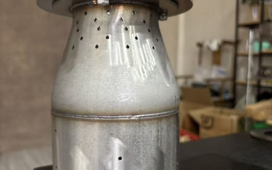 Hillrein stainless steel gasifier stove image showing the Zhengtu 304 inner chamber with normal heat marks but clear air holes for steady airflow